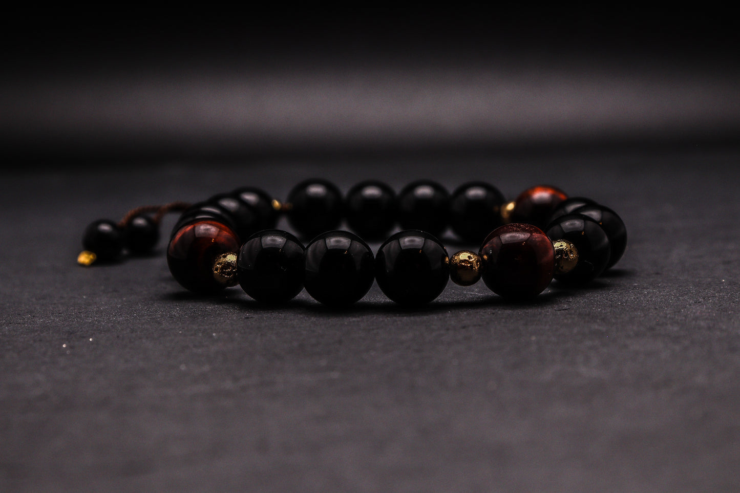 ONYKS Z BAWOLIM OKIEM I LAWĄ - BRANSOLETKA MĘSKA